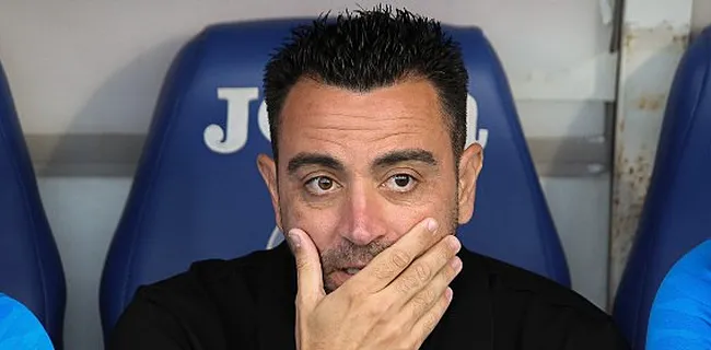 Xavi met handen in het naar na interland-drama
