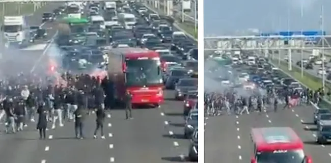 Pure waanzin! Ajax-fans bestormen spelersbus ... op volle snelweg