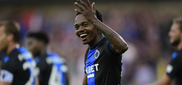 Club's Percy Tau and Anderlecht's Derrick Luckassen fight for the